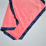 Coral Minky Baby Blanket With Navy Satin Trim