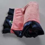 Coral Minky Baby Blanket With Navy Satin Trim
